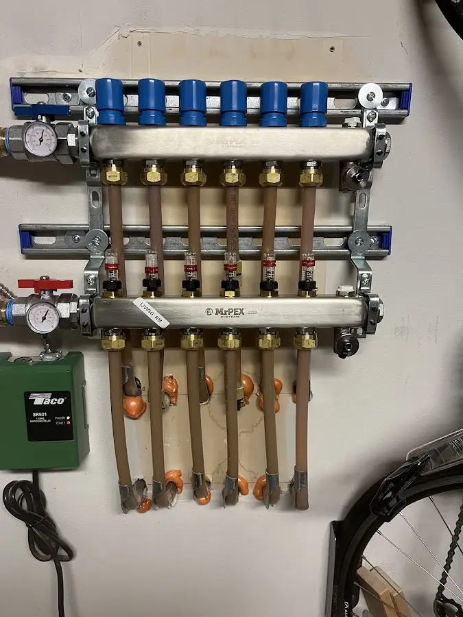 Plumber performing Gas Leak Detection at a residential property in Raymond